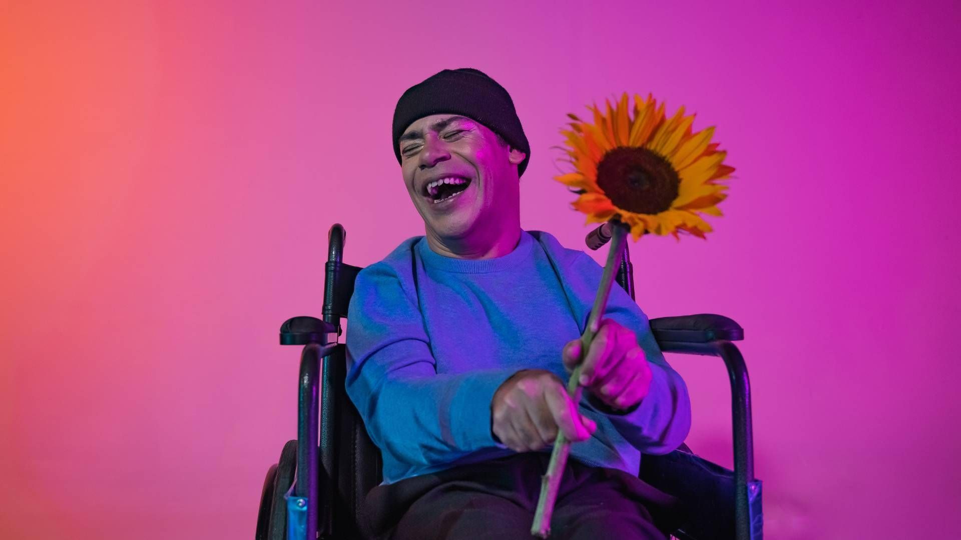 Person som smiler. Foto: Pexels